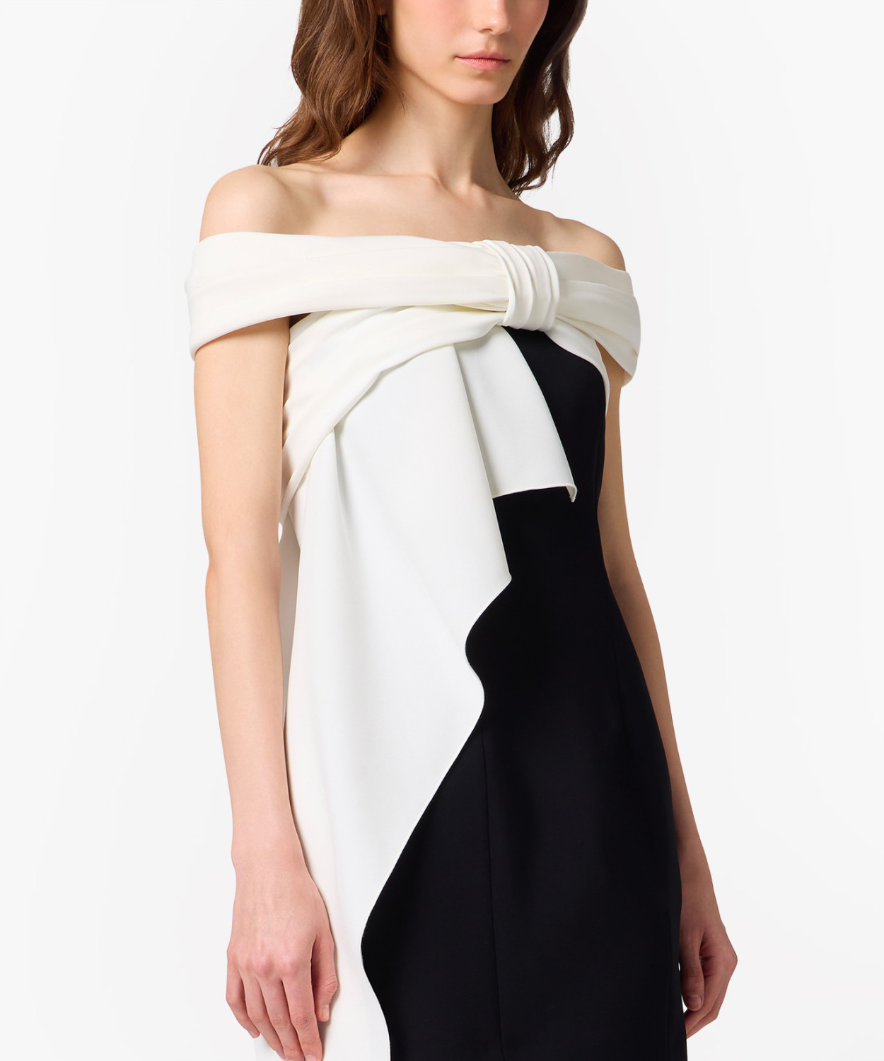 IMG_3189 - New Trend Off-shoulder black-and-white color-block dress with white draped fold across the chest and side knot detail on a model's torso.