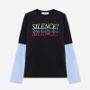 IMG_3210 - New Trend Black short-sleeve T-shirt over a blue-striped long-sleeve shirt, with 'SILENCE!' repeated in yellow, blue, and red across the chest.