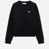 Black crewneck sweatshirt with a small white embroidered 'M' logo on the left chest and ribbed cuffs and hem.