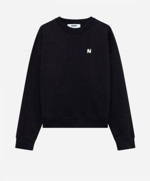 Black crewneck sweatshirt with a small white embroidered 'M' logo on the left chest and ribbed cuffs and hem.
