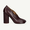 Dark burgundy leather pump with a chunky block heel, shown in side view