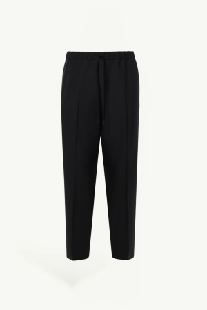 Black trousers with an elastic drawstring waistband and straight legs.