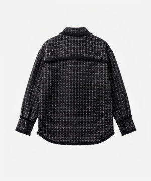 Back view of a black-and-white checkered tweed jacket with fringe trim along the yoke and hem, long sleeves with buttoned cuffs.