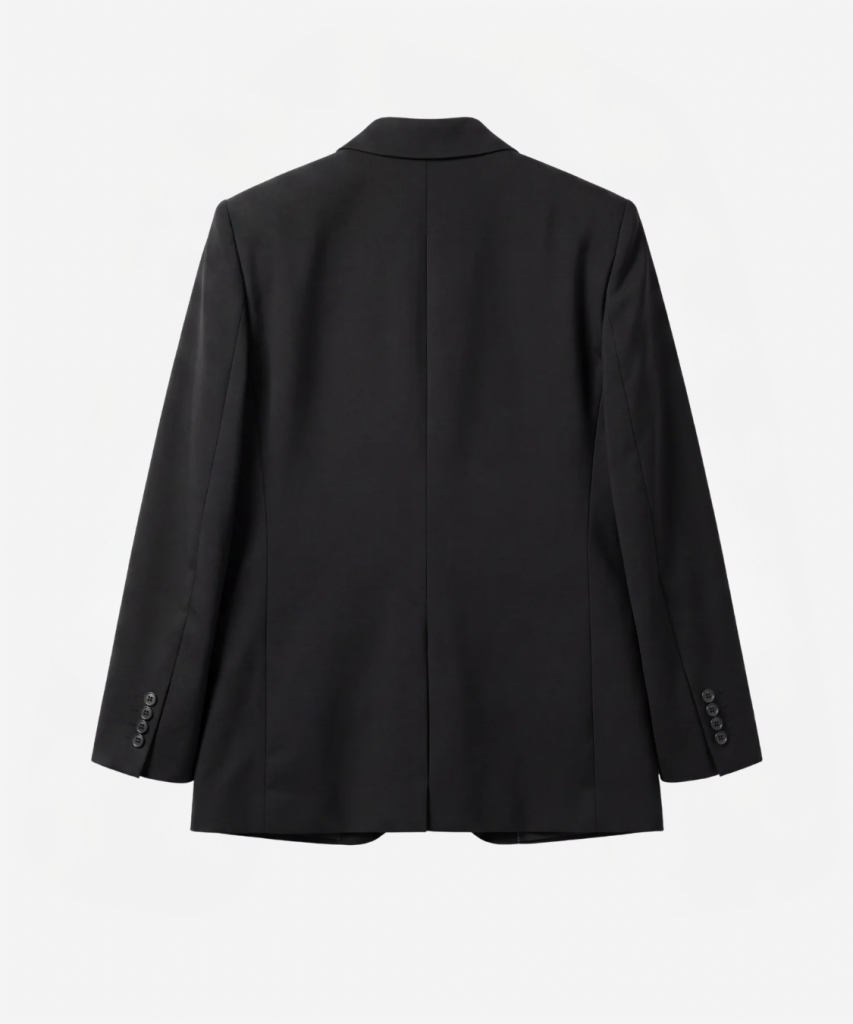 Back view of a black tailored blazer on a light background, featuring a central back seam, structured shoulders, and a straight hem with cuff buttons visible at the sleeves.