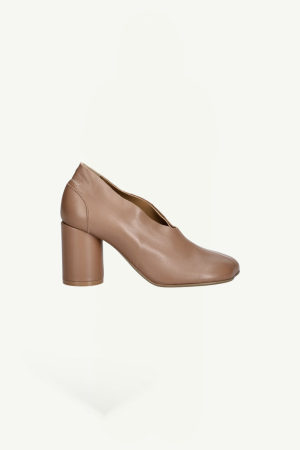 Tan leather women's pump with a chunky block heel and rounded toe, shown in side profile.