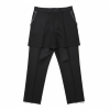 Black layered trouser look: shorts worn over slim pants with zippered pockets on the sides and belt loops