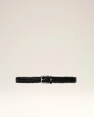 Black braided belt laid flat with a rectangular metal buckle on a pale background, showing its woven texture and loop detail.