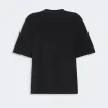 Black short-sleeve crewneck T-shirt on a light background, showing a relaxed fit and minimal design.
