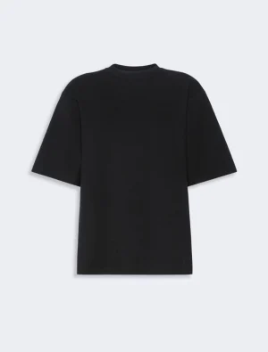 Black short-sleeve crewneck T-shirt on a light background, showing a relaxed fit and minimal design.