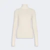 IMG_3790 - New Trend Cream ribbed turtleneck sweater with long sleeves on a light background.