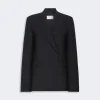 IMG_3801 - New Trend Black blazer with wide lapels and a subtle overlap, front pockets visible, on a light background.