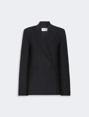Black blazer with wide lapels and a subtle overlap, front pockets visible, on a light background.
