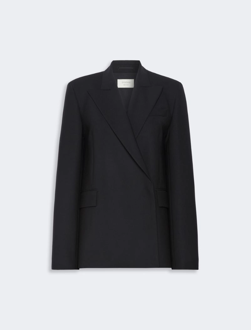 IMG_3801 - New Trend Black blazer with wide lapels and a subtle overlap, front pockets visible, on a light background.
