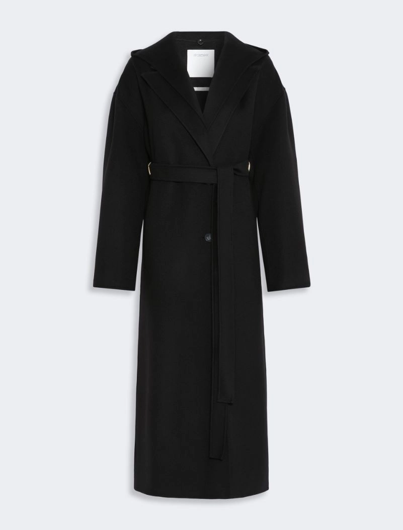 IMG_3818 - New Trend Long black wool coat with a self-tabric belt and wide lapels against a light gray background.