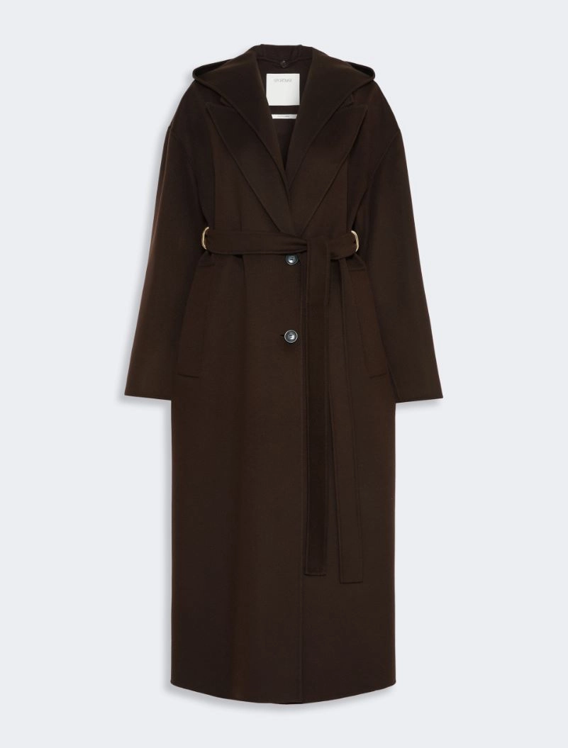 IMG_3824 - New Trend Long brown knee-length belted coat with wide lapels and front buttons on a pale background, showing a self-tie belt at the waist.