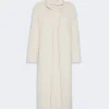 IMG_3830 - New Trend Long cream coat with a high, folded collar and an open front drape on a minimalist design.
