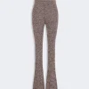 Brown heathered knit bell-bottom trousers with a high waistband and flared legs, textured fabric detail visible.