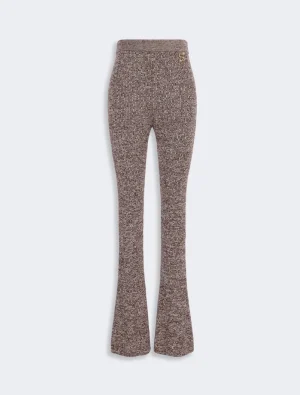Brown heathered knit bell-bottom trousers with a high waistband and flared legs, textured fabric detail visible.