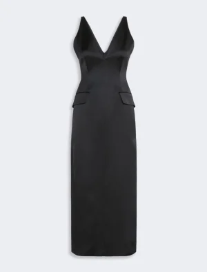 Black halter-neck maxi dress with a deep V neckline and side pockets at hip level.