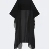 Black draped shawl with sheer panels and an asymmetric hem, shown flat for product view