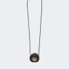 IMG_3863 - New Trend Brown round textured crossbody bag with a long thin strap and gold hardware.