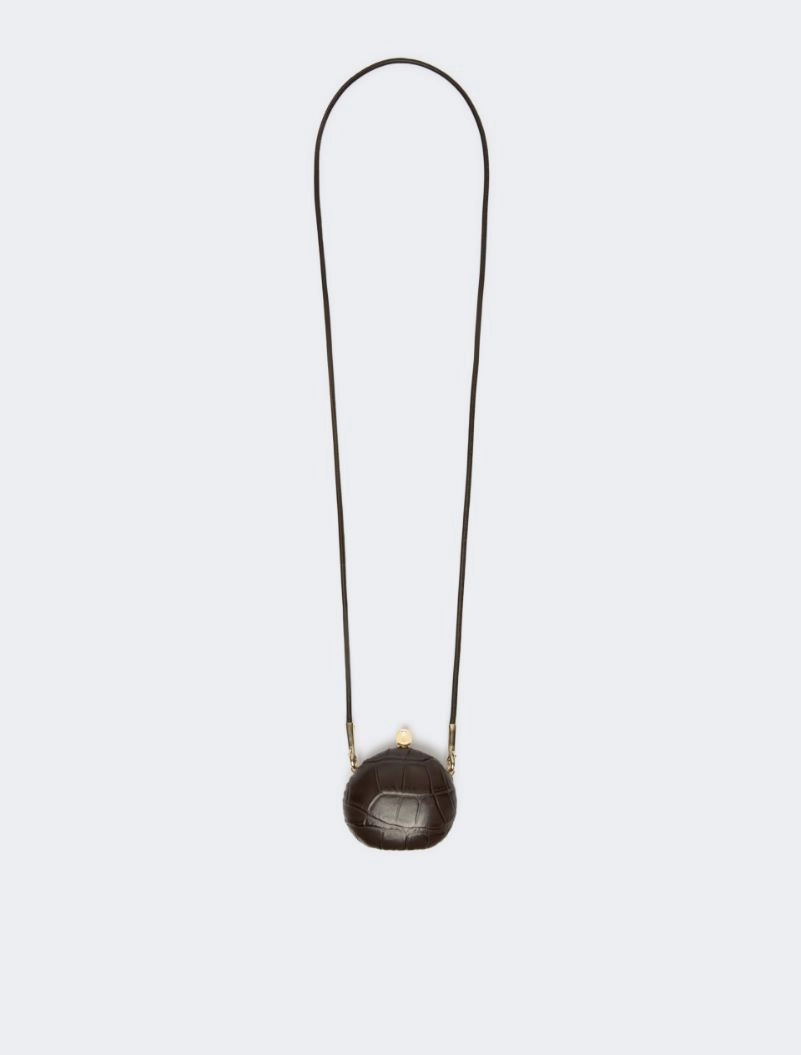 IMG_3863 - New Trend Brown round textured crossbody bag with a long thin strap and gold hardware.