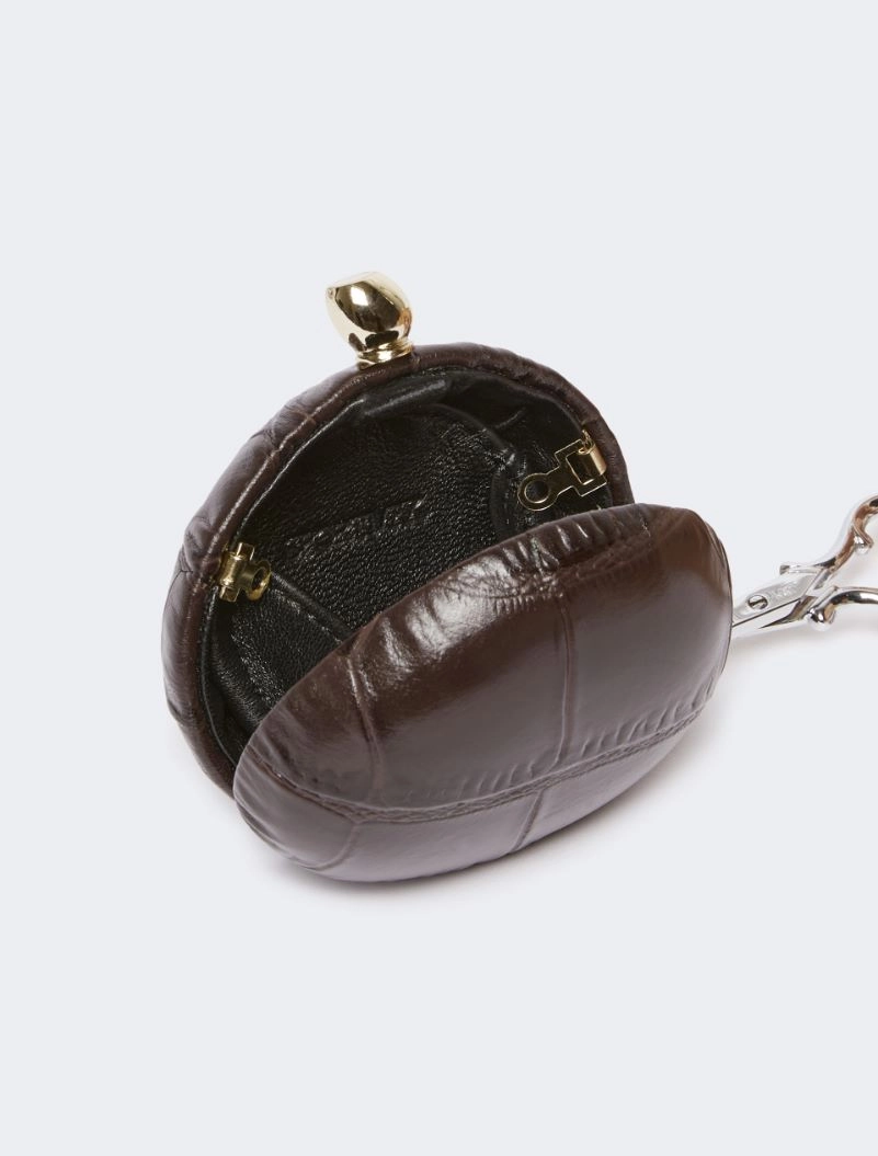 IMG_3865 - New Trend Brown round brown leather coin purse with a gold kiss-lock clasp and keychain attachment on the side.