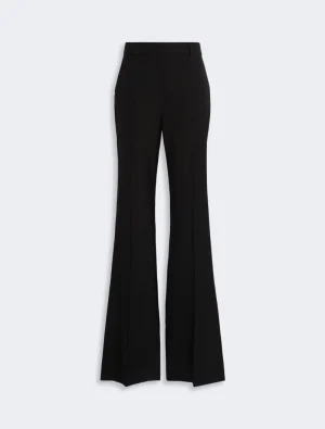 Black high-waisted wide-leg trousers with a flared hem, shown on a light background