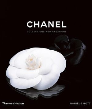 Chanel book cover with a white camellia on a black background and the title 'CHANEL COLLECTIONS AND CREATIONS.'