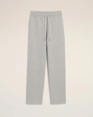 Light gray sweatpants with a drawstring waist laid flat against a pale background.