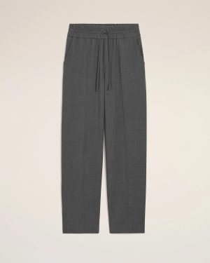 Gray wide-leg pants with an elastic drawstring waist laid flat on a light background.