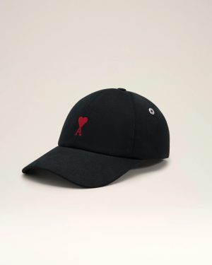 Black baseball cap with a small red heart and the letter A embroidered on the front panel.