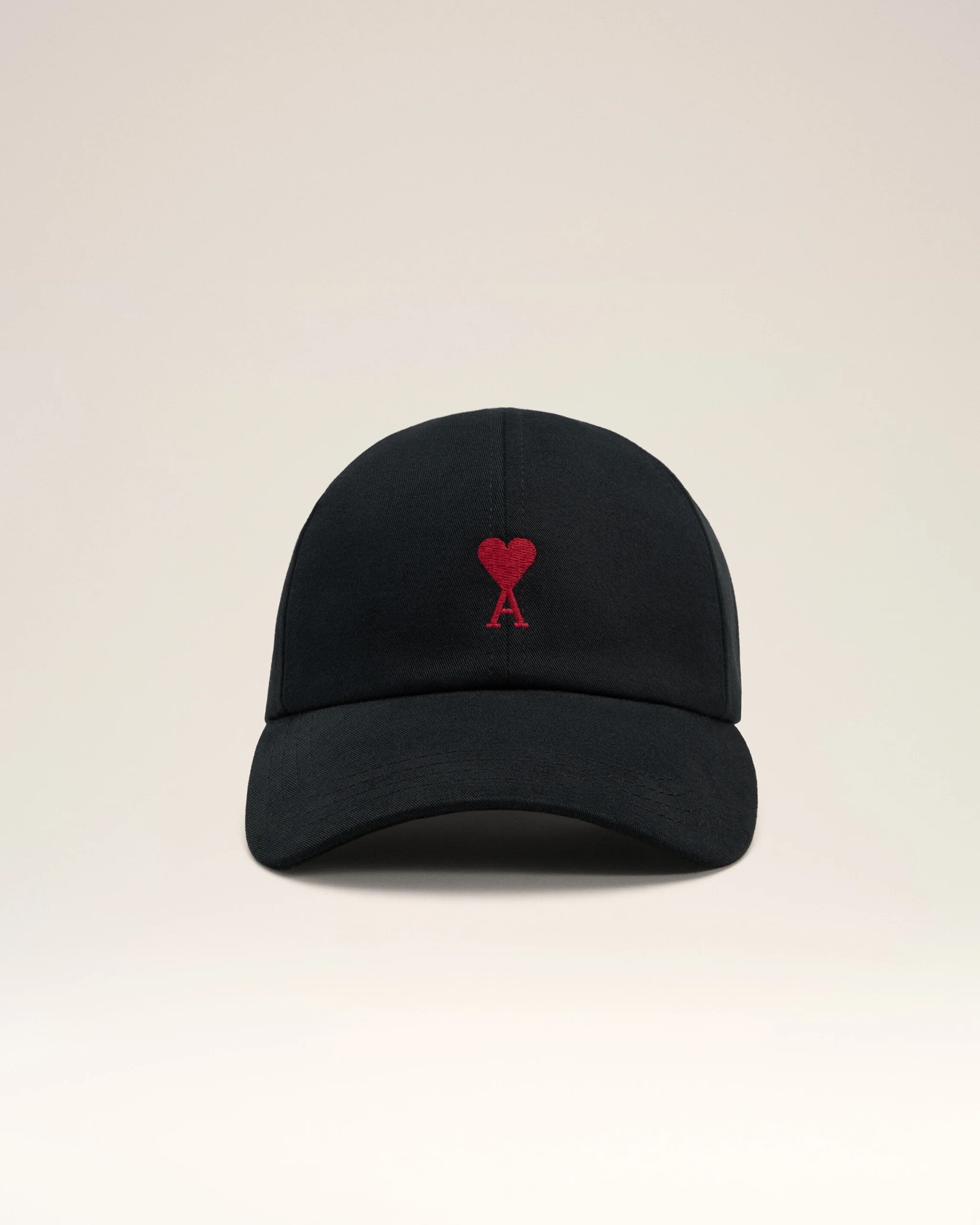 Image 146 - New Trend Front view of a black baseball cap with a red heart and letter A embroidered on the front panel.