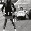 Image 15 - New Trend Fashion magazine cover with a model in a black dress and white boots, standing beside a vintage race car; bold title reads 'THE STYLIST LIFE GRAND PRIX' and 'teNeues' logo.