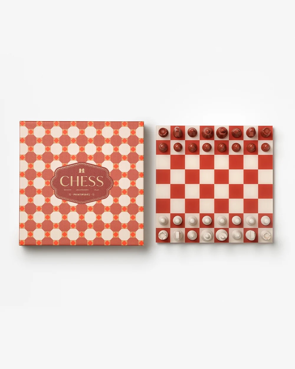 Image 182 - New Trend Red-and-white decorative chess set: a checkered board with matching patterned box beside it (chess pieces on board).