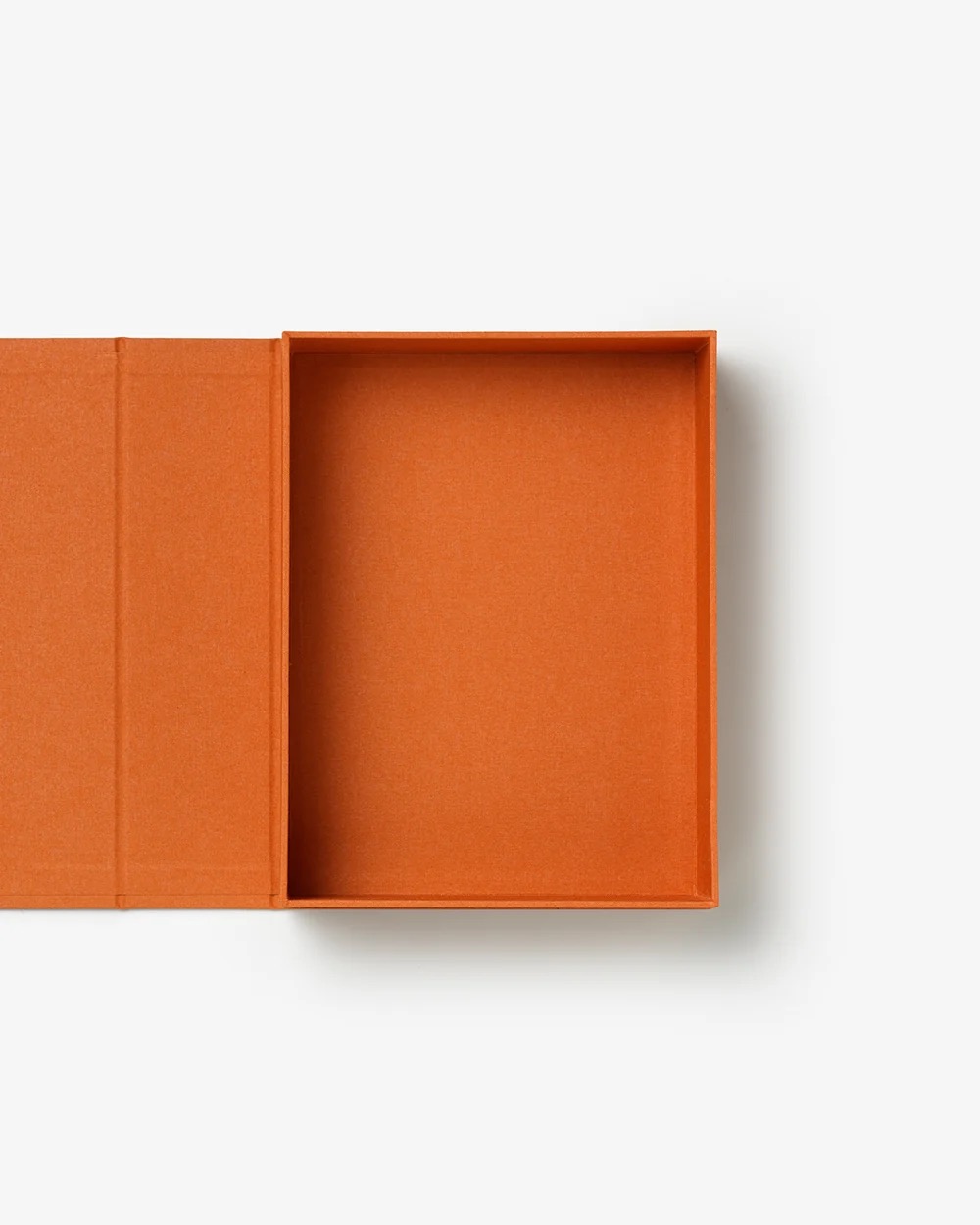 Image 191 - New Trend Orange rectangular box with its lid open, showing an empty interior on a white background.