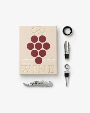 Beige wine-themed gift box with a grape cluster graphic, surrounded by wine accessories: corkscrew, foil cutter, pour spout, stopper, and wand tool.