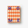 Image 201 - New Trend Book cover with orange and white diamond pattern and bold blue letters spelling HOME