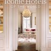 Book cover for Iconic Hotels of the World by Carsten K. Rath showing an elegant hotel lobby with chandelier and luxurious seating in a white paneled room