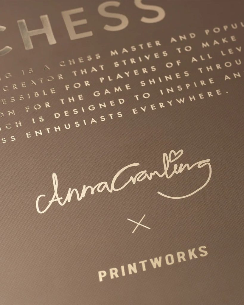 Close-up of a printed surface showing a handwritten signature 'AnnaGarling' with a heart, an 'X' mark, and the word 'PRINTWORKS' beneath.