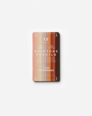 Tin case of Skintone Pencils, 12 soft-color pencils in a warm striped gradient from peach to brown.