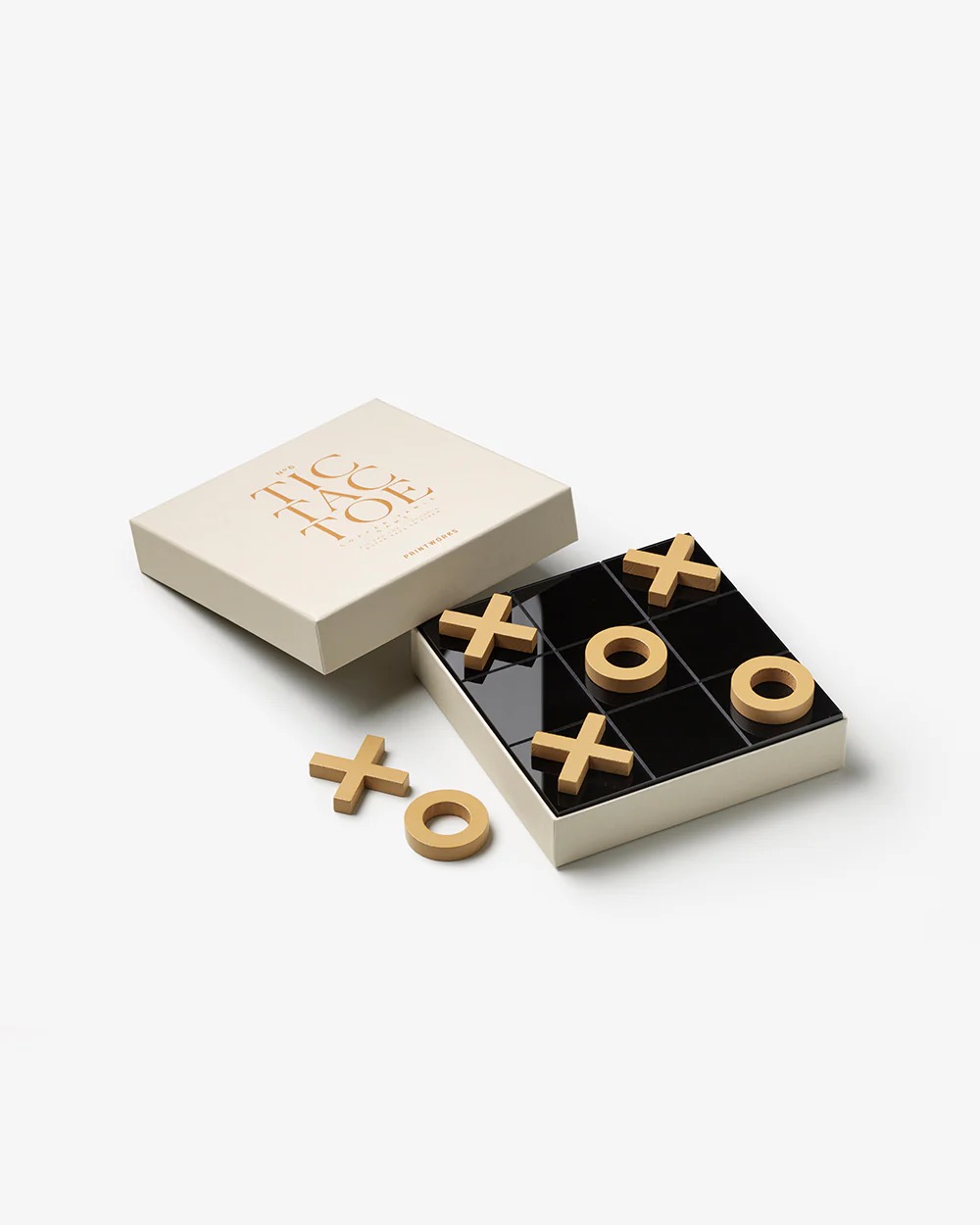 Image 242 - New Trend Wooden X and O tic‑tac‑toe pieces arranged on a glossy black grid inside a beige box, product shot.