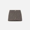 Image 253 - New Trend Brown tweed mini skirt with five decorative buttons down the front.