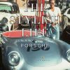 Vintage Porsche speedster with oversized white text 'THE STYLISH LIFE' over it; man stands beside the car on a street.