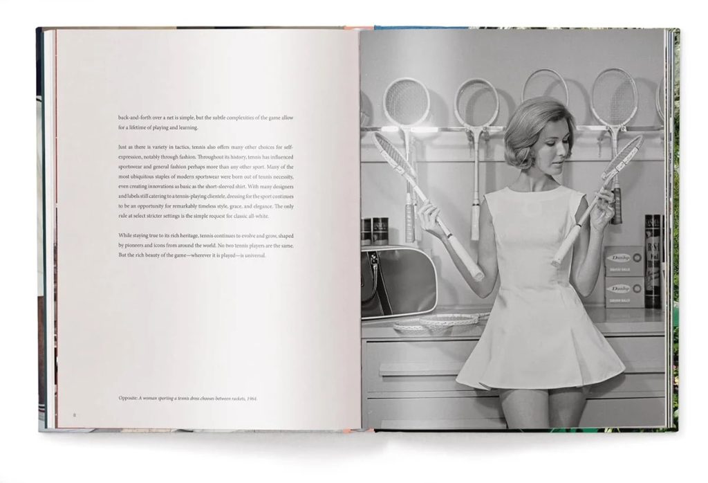 Open magazine spread: left page with paragraphs of text; right page shows a vintage black-and-white photo of a woman in a short dress holding two tennis rackets in a retro kitchen setting.