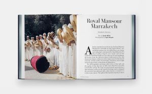 Open magazine spread: left page shows musicians in white robes with drums; right page features a 'Royal Mansour Marrakech' article.