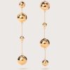 Gold-tone drop earrings with stacked polished spheres on delicate chains, long dangle style