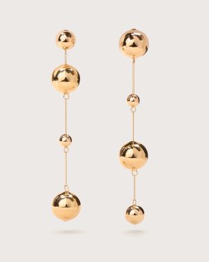 Gold-tone drop earrings with stacked polished spheres on delicate chains, long dangle style