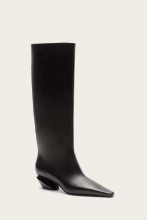 Black knee-high leather boot with a squared toe and low heel on a pale background.