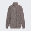 Back view of a brown marled knit turtleneck sweater with long sleeves.
